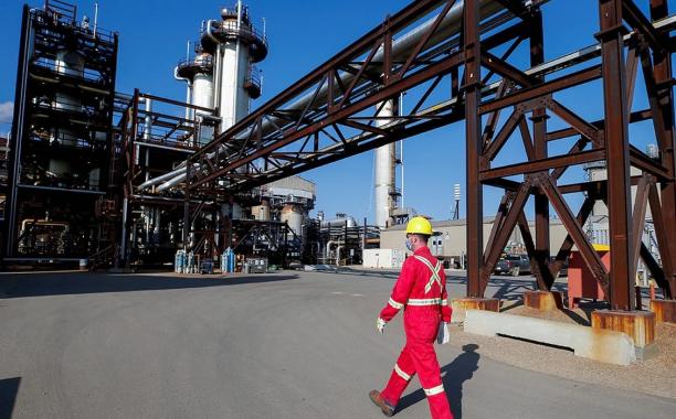  A Shell employee walks past the company's Quest Carbon Capture and Storage facility in Fort Saskatchewan, Alta. Photo by Todd Korol/Reuters 