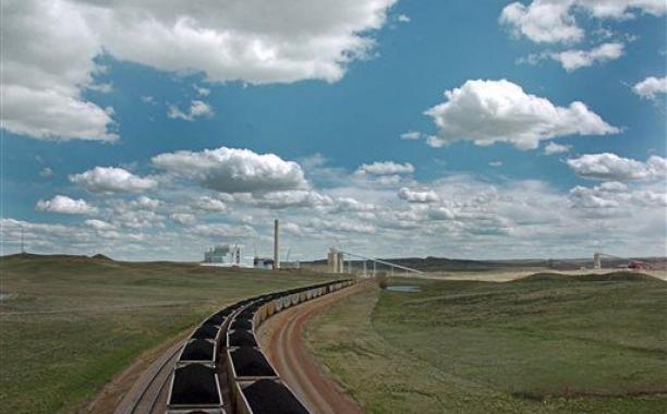 The Associated Press  FILE - In this Thursday, April 29, 2010 file photo, a pair of coal trains idle on the tracks near Dry Fork Station, a coal-fired power plant being built by the Basin Electric Power Cooperative near Gillette, Wyo. A laboratory where teams of researchers will study how to keep carbon dioxide emitted by coal-fired power plants from entering the atmosphere will be built at a Basin Electric power plant near Gillette, a spokesman for Gov. Matt Mead said Wednesday, Oct. 7, 2015. (AP Photo/Mat