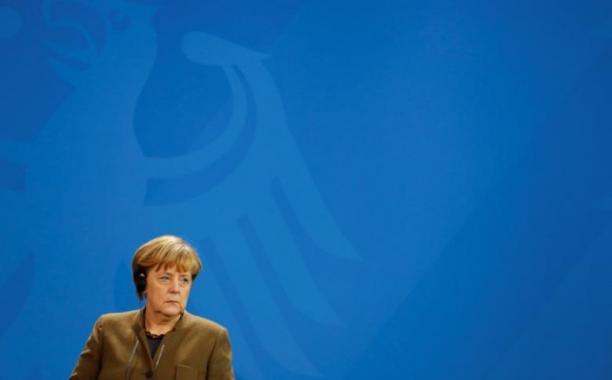 German Chancellor Angela Merkel makes a statement to the media after a meeting with French President Francois Hollande at the Chancellery in Berlin, Germany, December 13, 2016. REUTERS/Fabrizio Bensch